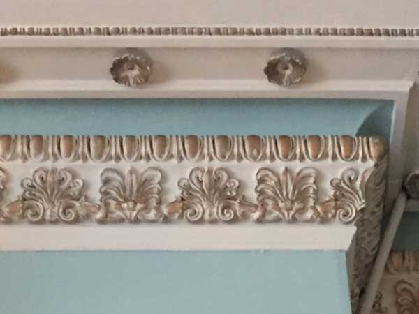 One of the elaborate original plaster cornices