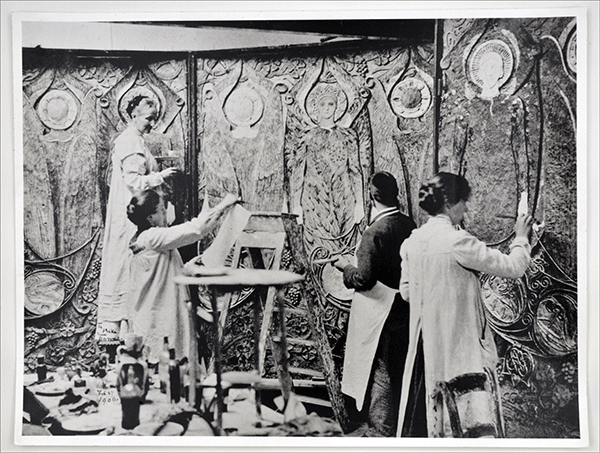 Mary and assistants painting in the chapel